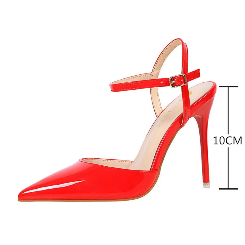 Patent Leather Stiletto Pumps - Women's Pointed Party Heels on display with a shiny black finish and elegant buckle strap.