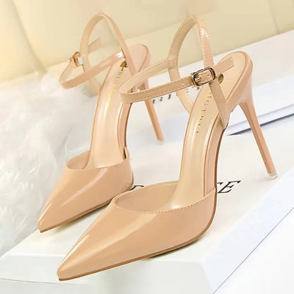 Patent Leather Stiletto Pumps - Women's Pointed Party Heels on display with a shiny black finish and elegant buckle strap.