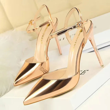 Patent Leather Stiletto Pumps - Women's Pointed Party Heels on display with a shiny black finish and elegant buckle strap.