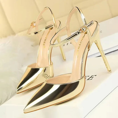 Patent Leather Stiletto Pumps - Women's Pointed Party Heels on display with a shiny black finish and elegant buckle strap.